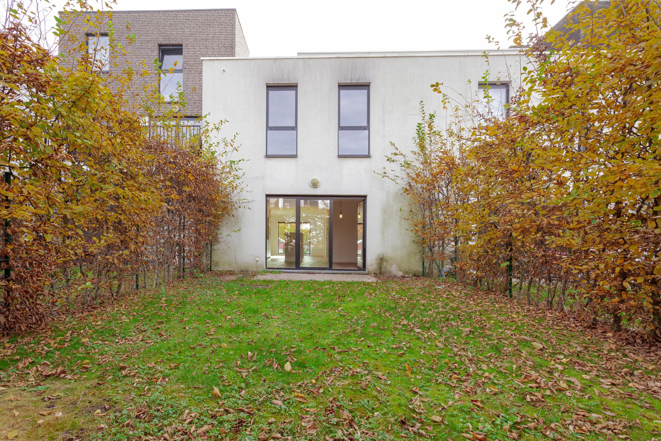 Recente woning met tuin, zonnig dakterras en staanplaats foto 3