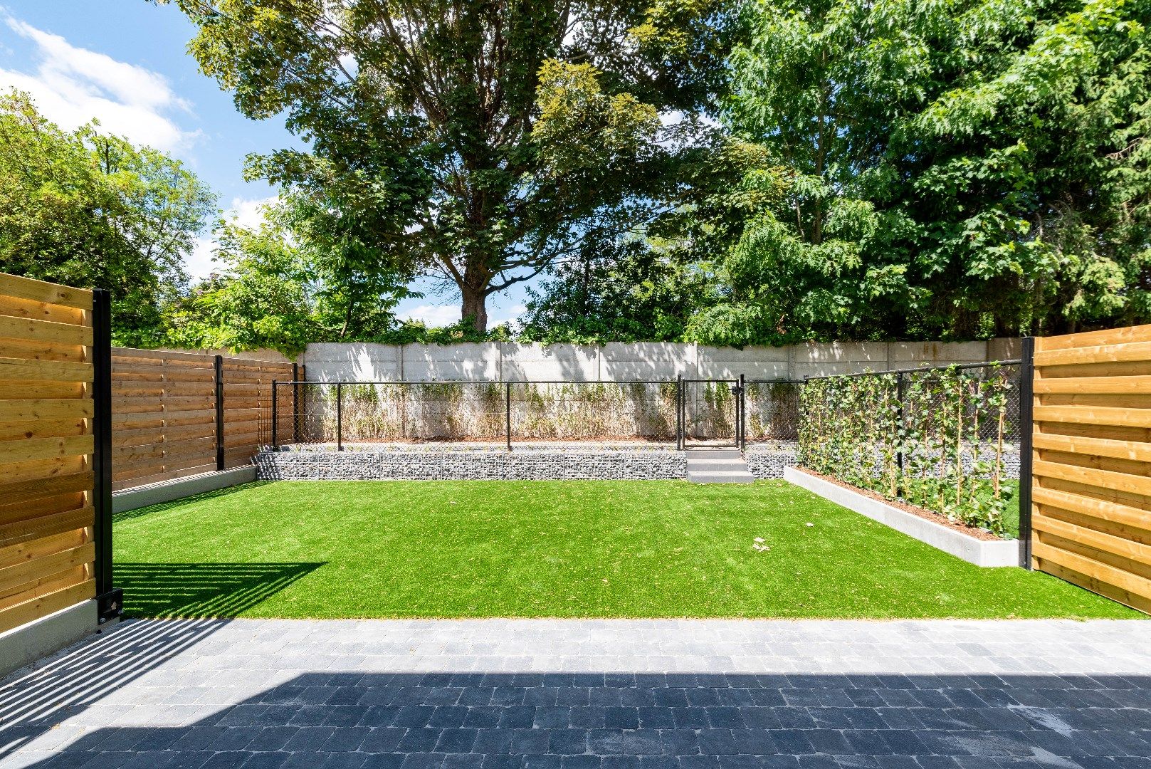 Modern BEN-appartement met groene tuin  foto 3