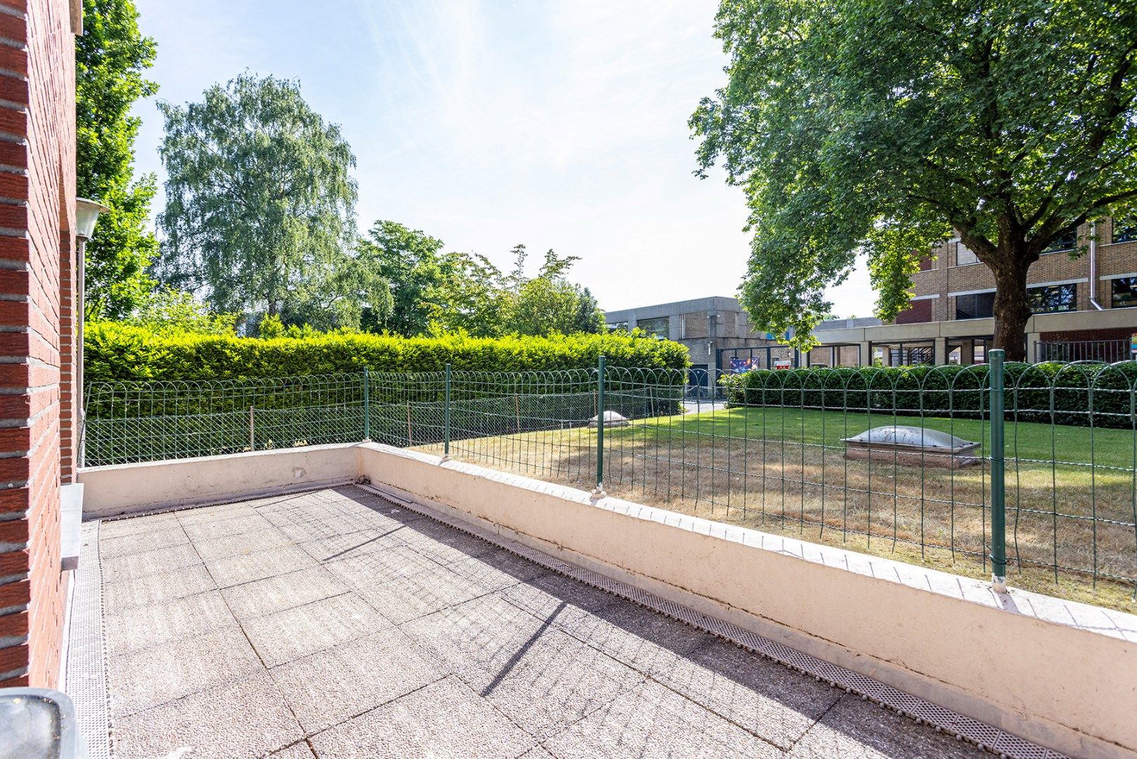 Gelijkvloers 2 slpk appartement met koer! foto 6
