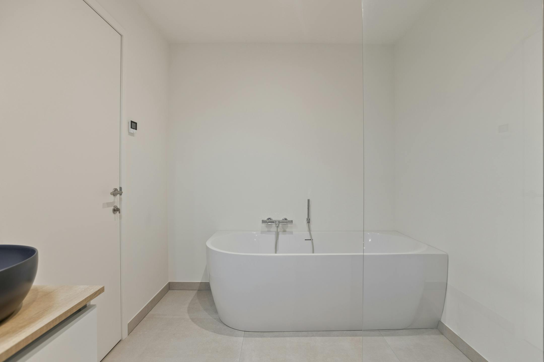 Nieuwbouwappartement te koop in de Ieperstraat in Poperinge foto 19