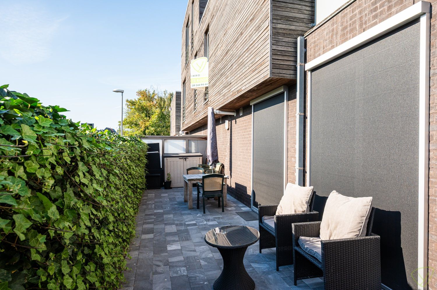 Instapklare woning met zonnige terrassen en garagebox foto 22