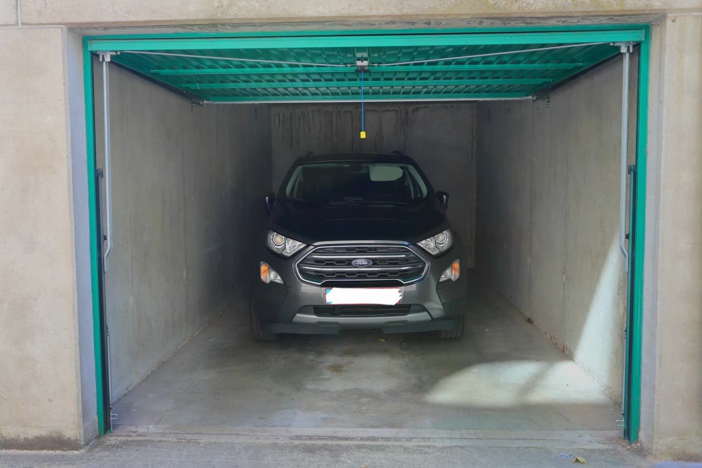 Te koop – 3 garageboxen in Genk centrum foto 2