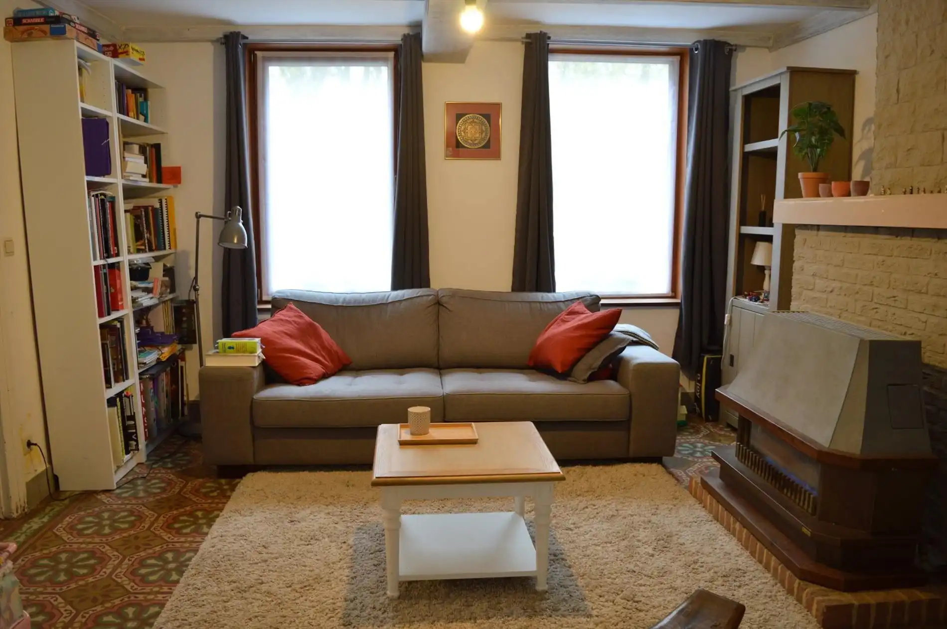 Knusse halfopen bebouwing met 1 zeer ruime slaapkamer foto 4