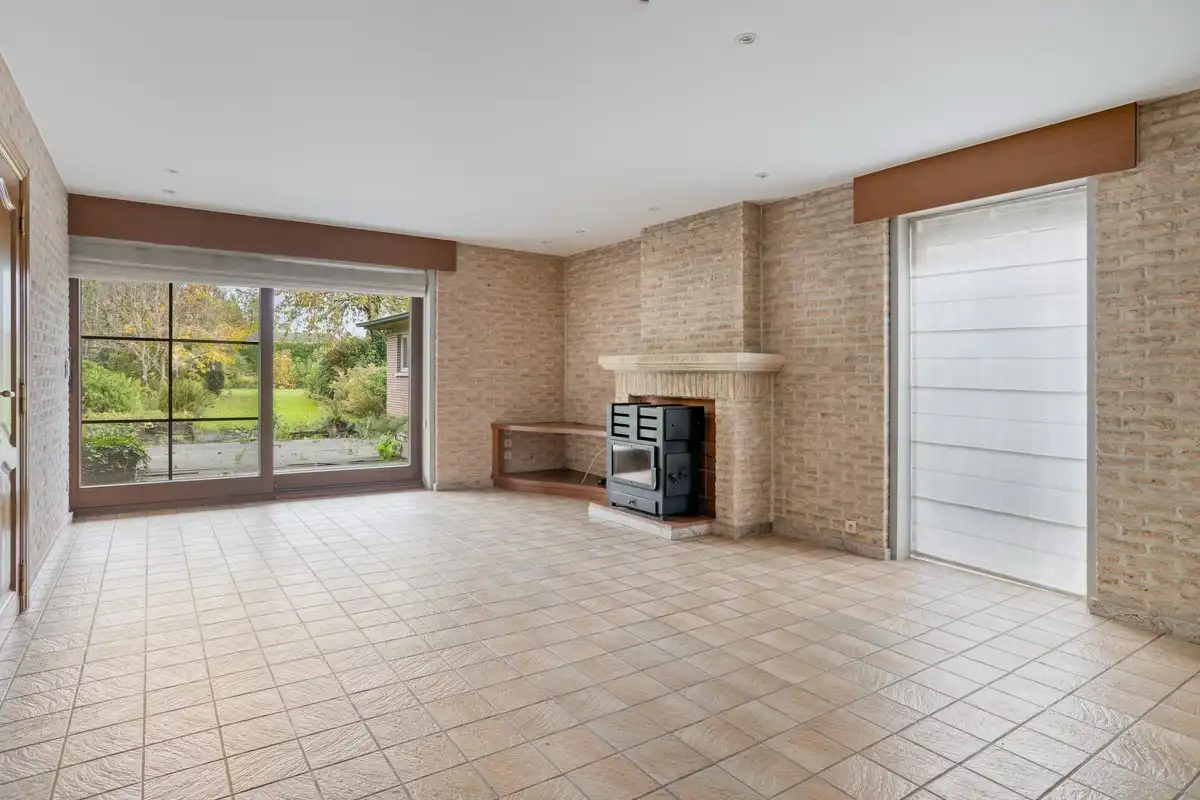 Bijzonder ruime woning met inpandige garage en 3 slks op een perceel van 1218 m². foto 4