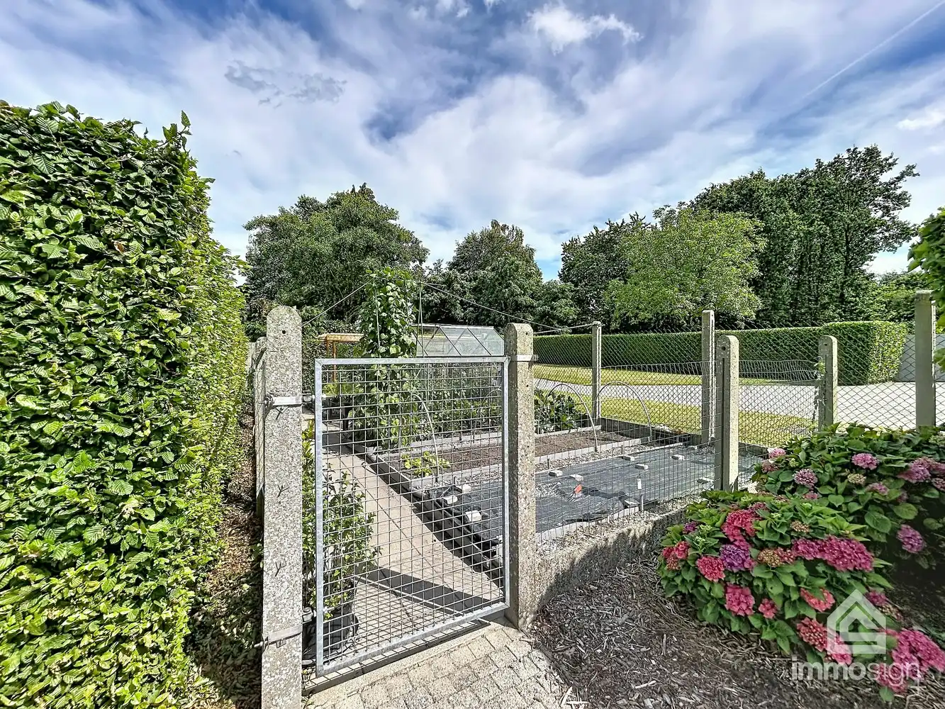 Ruime woning op bijna 2.000 m² grond met dubbele garage en werkhuis foto 40