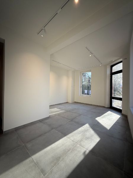 Unieke gerenoveerde eigendom met handelsruimte & triplex appartement met zicht op Coupure foto 24