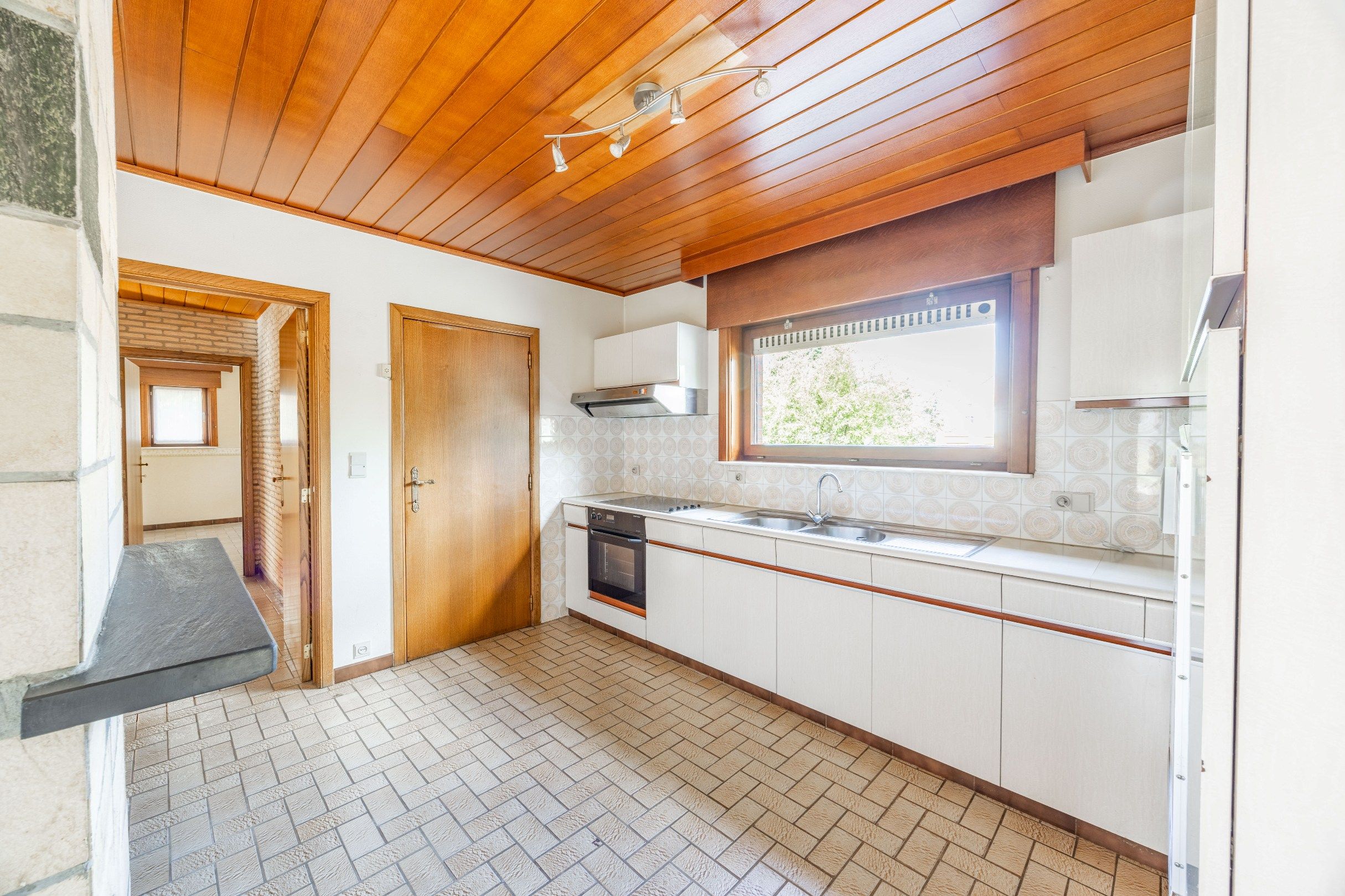 TRAPLOZE WONING MET ZONNIGE TUIN foto 9