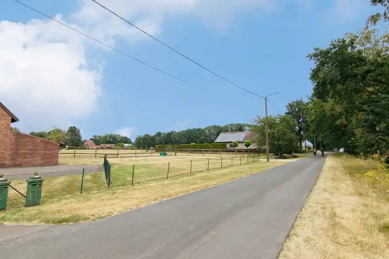 Bouwgrond van 10 aren op unieke locatie, volledig groen omgeven foto 7