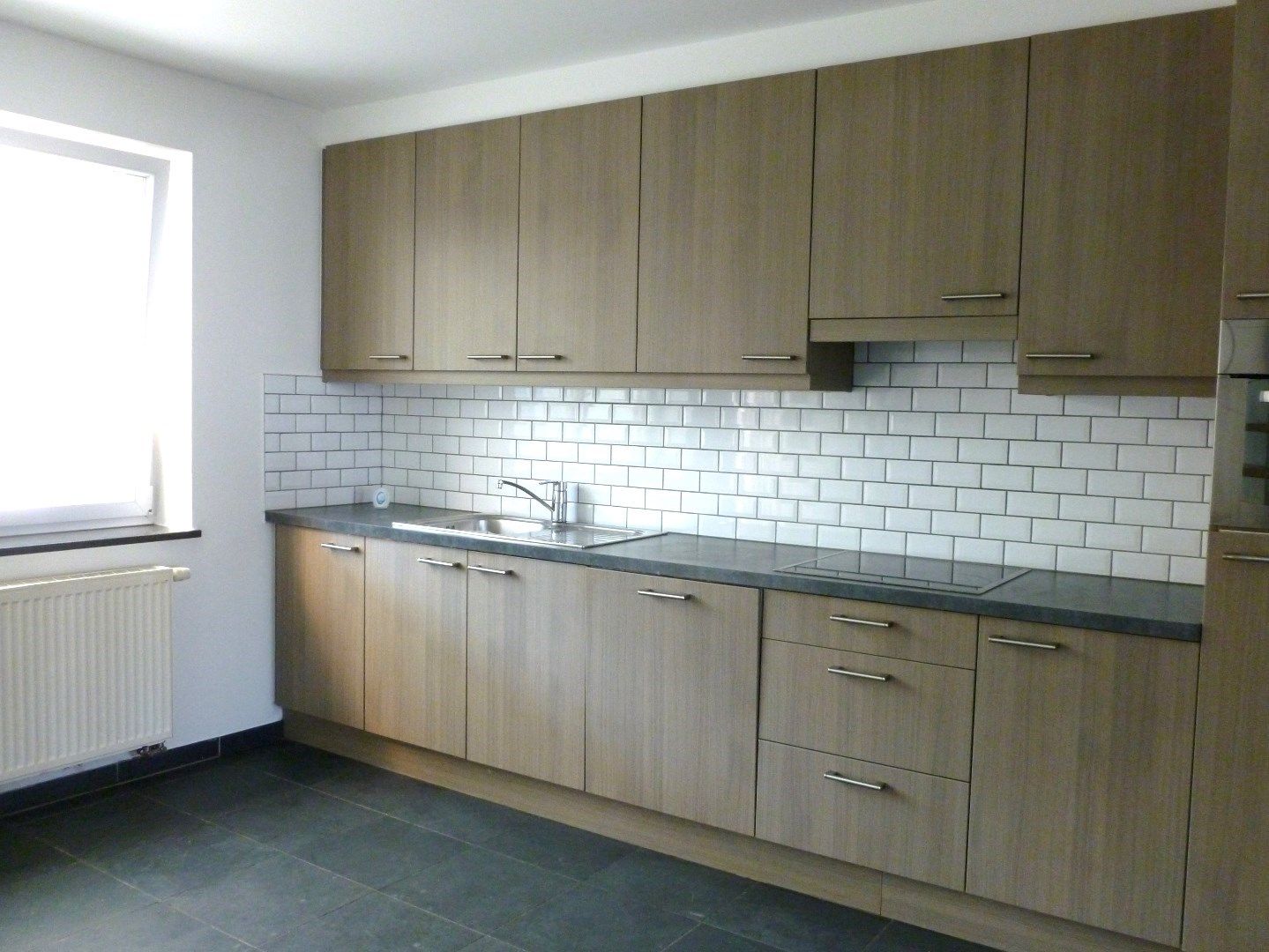 WONING te Lummen : 1 slpks, tuin, stpl foto 4