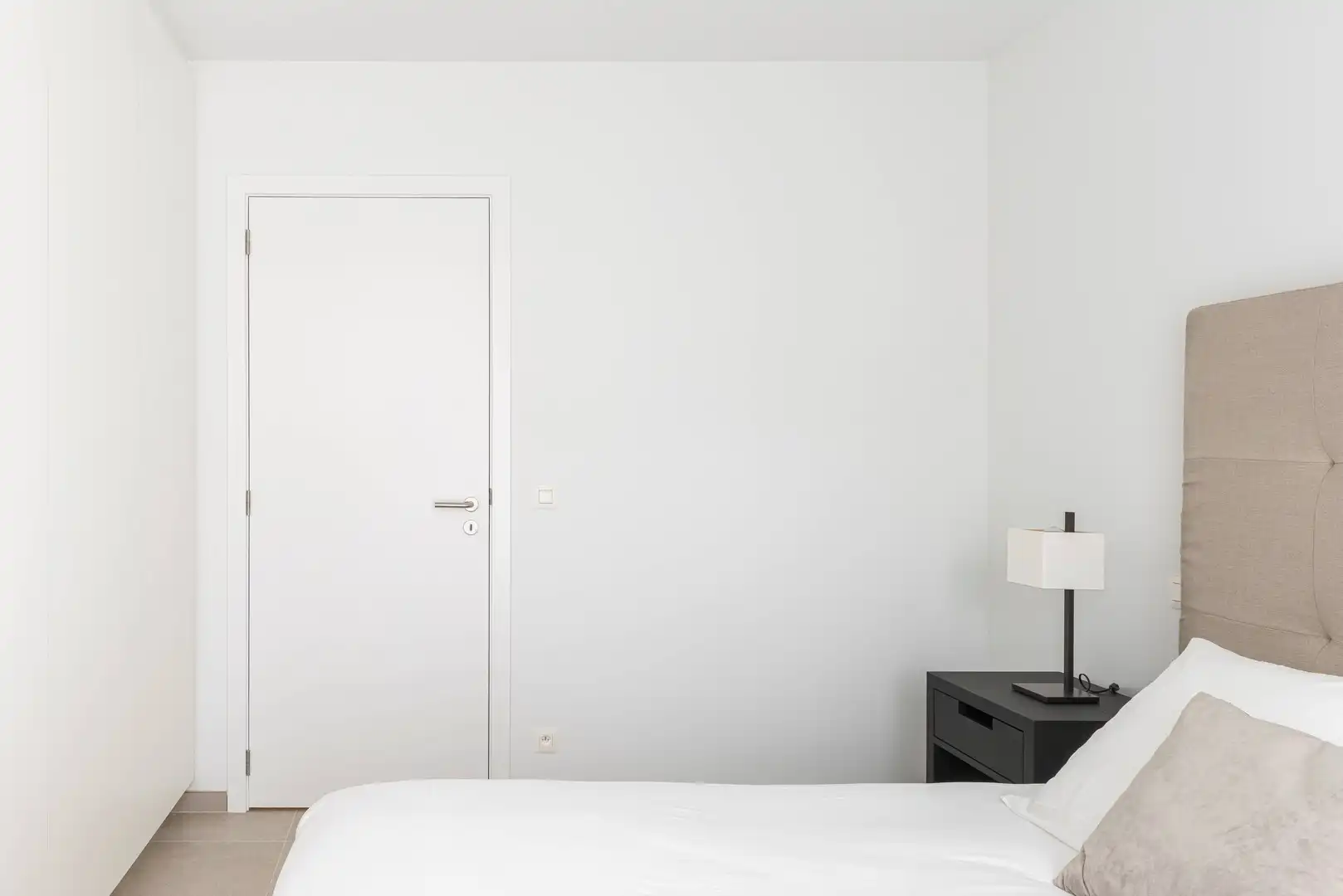 Lichtrijk recent instapklaar appartement met 2 slaapkamers, zonneterras, parking en ruime kelderberging foto 14