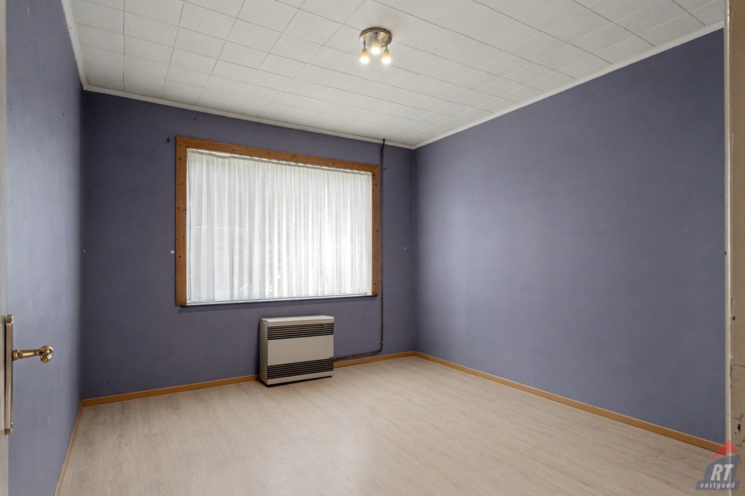 Gelijkvloerse halfopen woning met tuin en renovatiepotentieel in het hart van Sint-Truiden foto 13