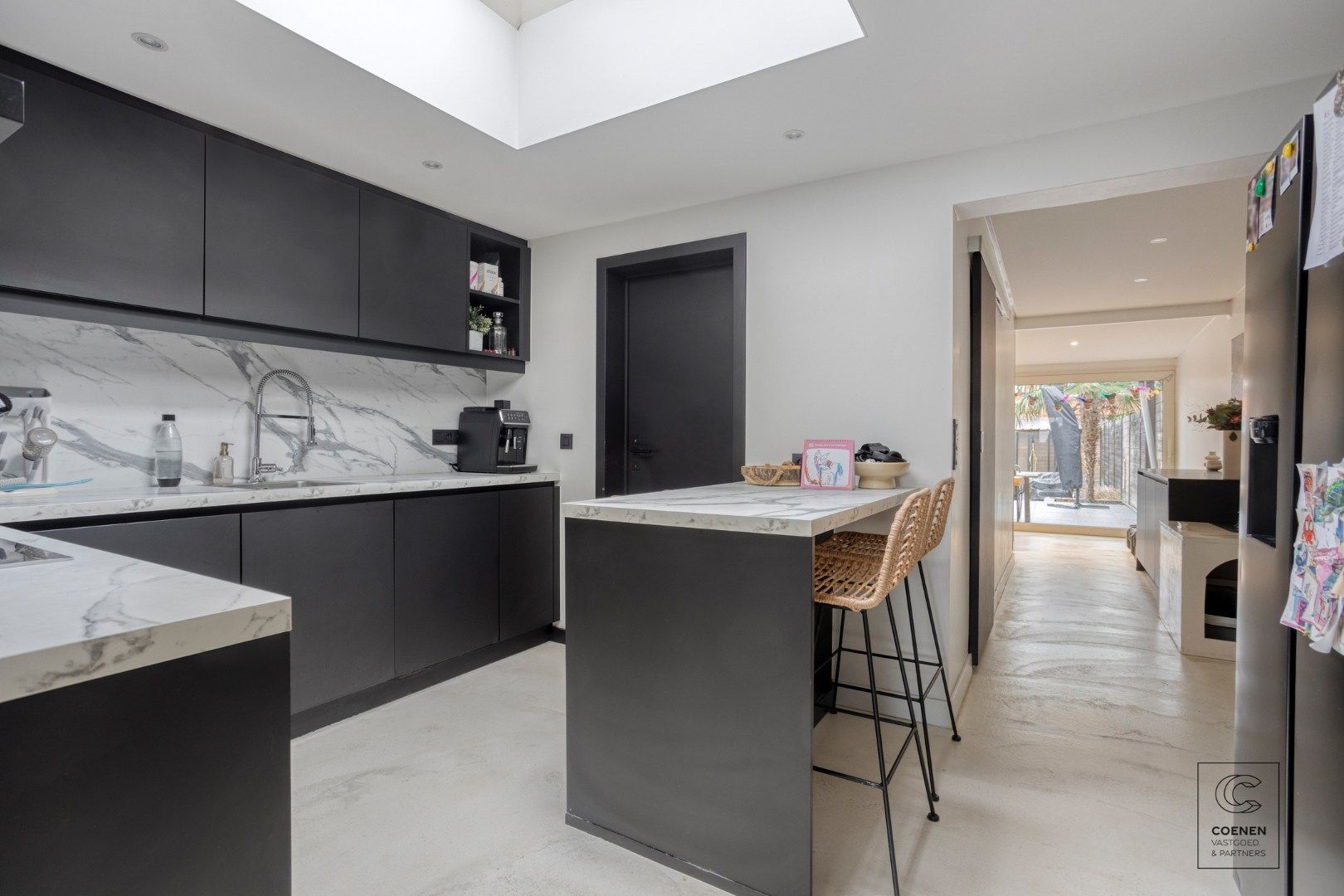 Instapklare gezinswoning van 141 m² met drie slaapkamers te Ekeren! foto 8