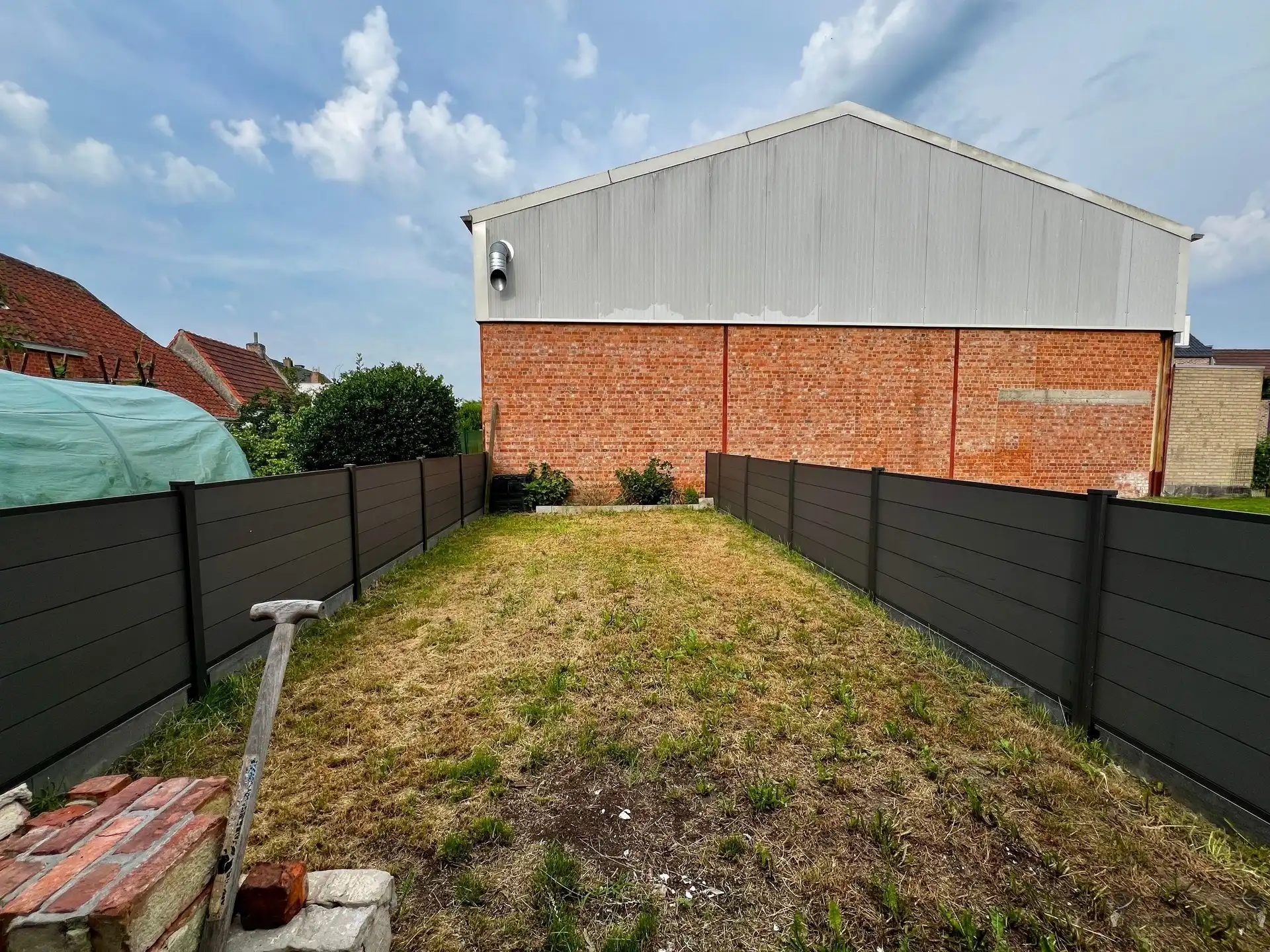 Te renoveren rijwoning met tuin foto 10