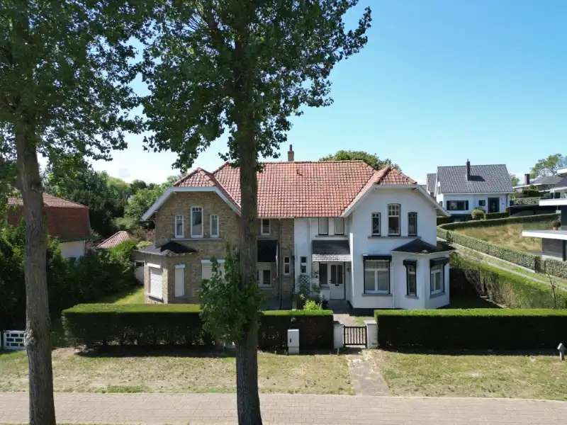 Unieke kans in Oostduinkerke-Bad – twee koppelwoningen met potentieel! foto 3