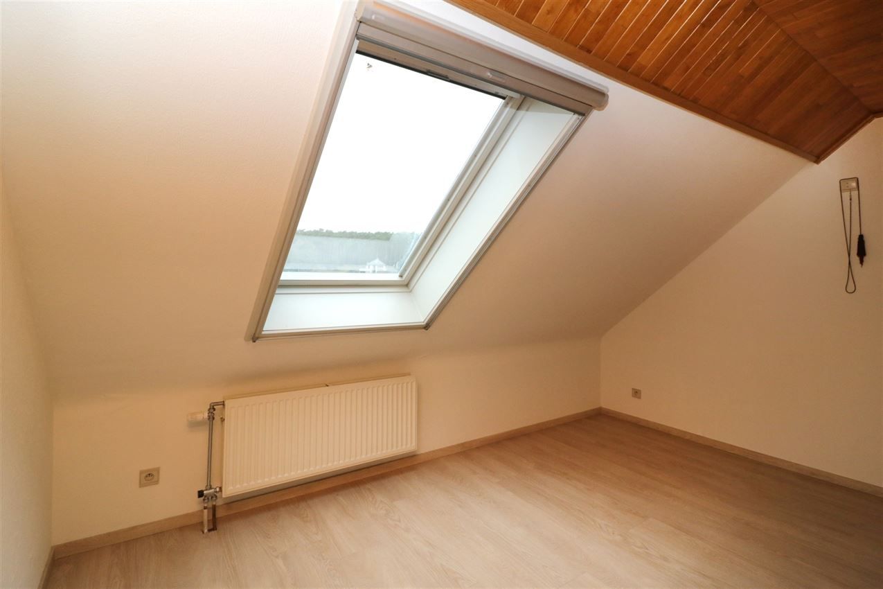 Centraal gelegen appartement met 3 slpk., garage en terras foto 18