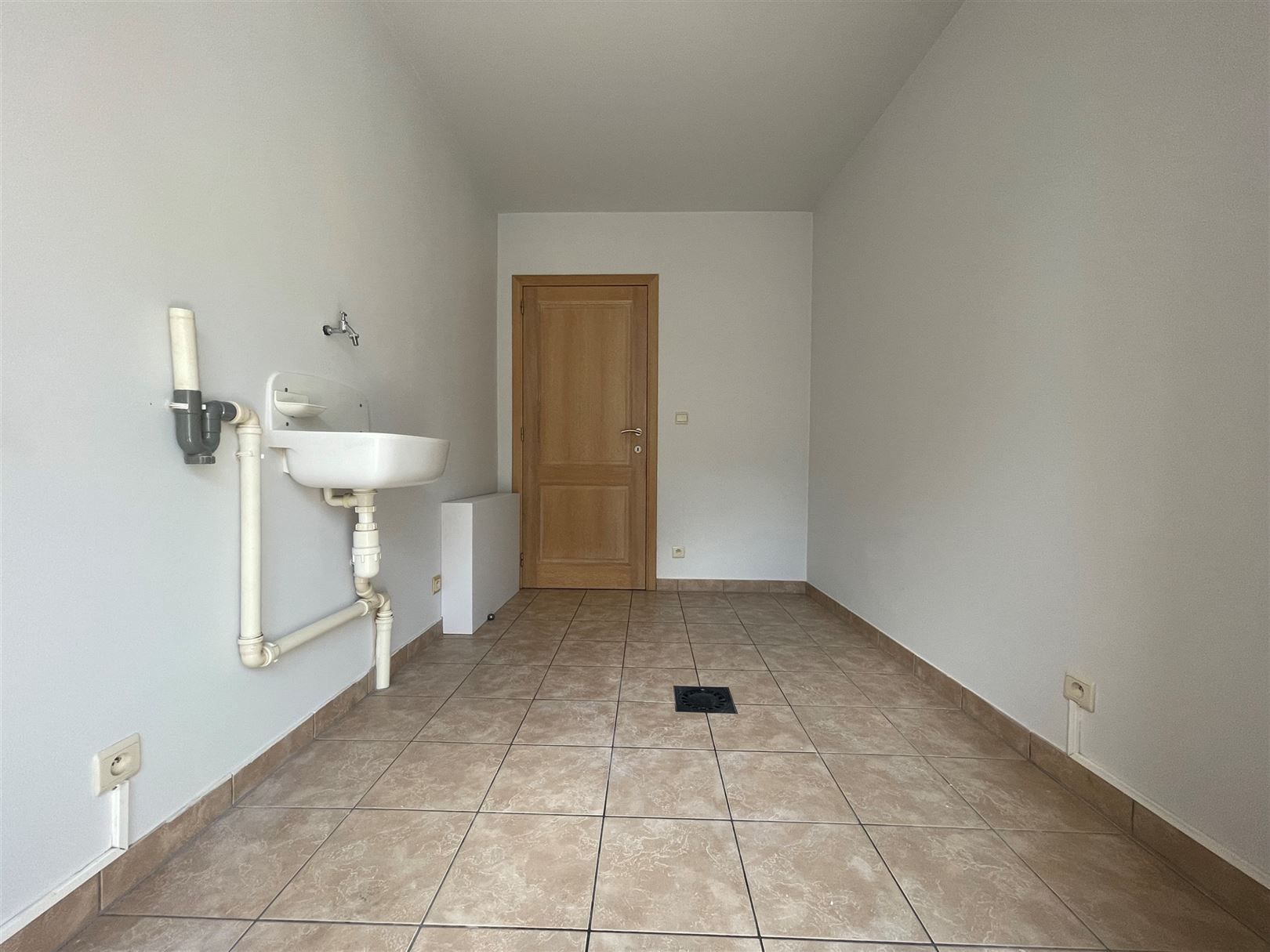 Gelijkvloerse appartement  met afgesloten koer  foto 9