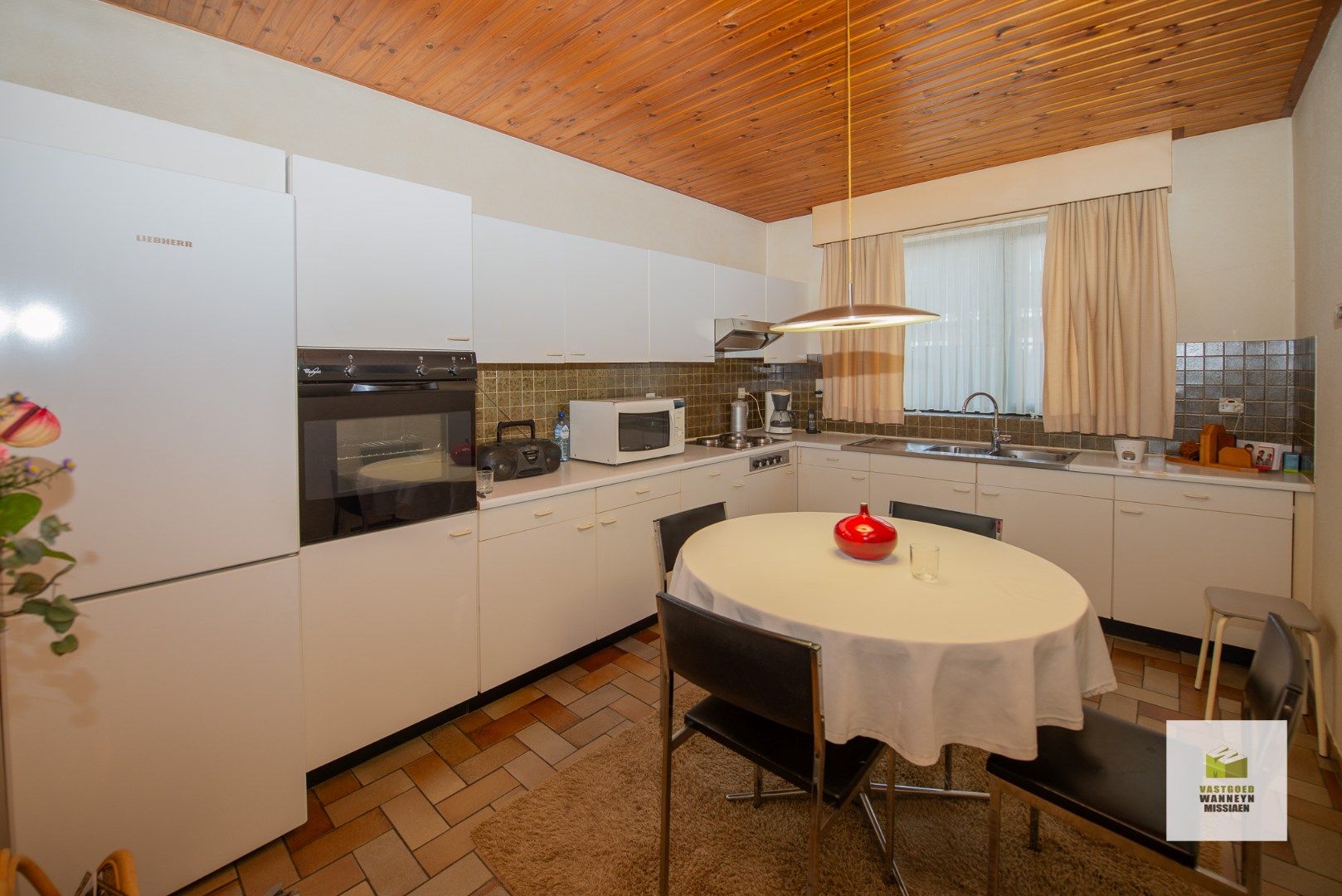 Open bebouwing met 2 gelijkvloerse kamers (extra mogelijk) op zeer centrale ligging foto 7