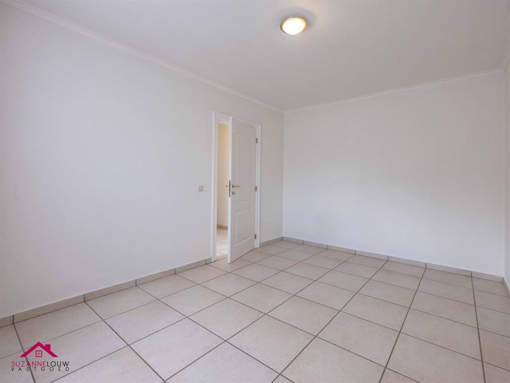 Ruim gelijkvloers appartement met 2 slaapkamers foto 27