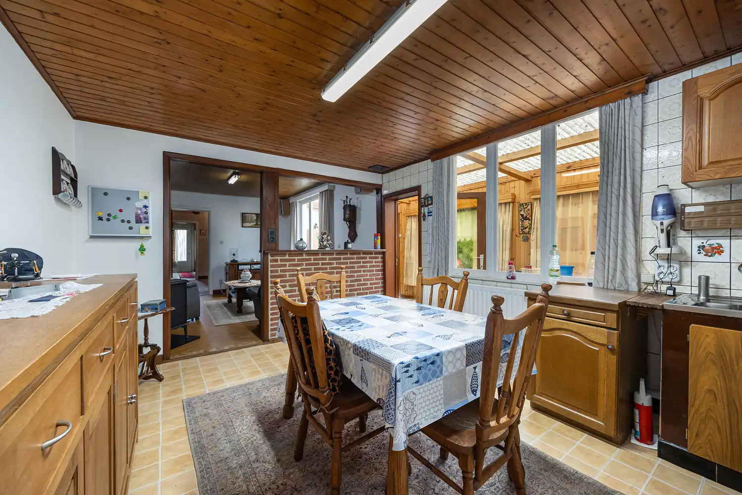 Halfopen woning op 575 m² met garage, carport en diepe tuin – te renoveren foto 11