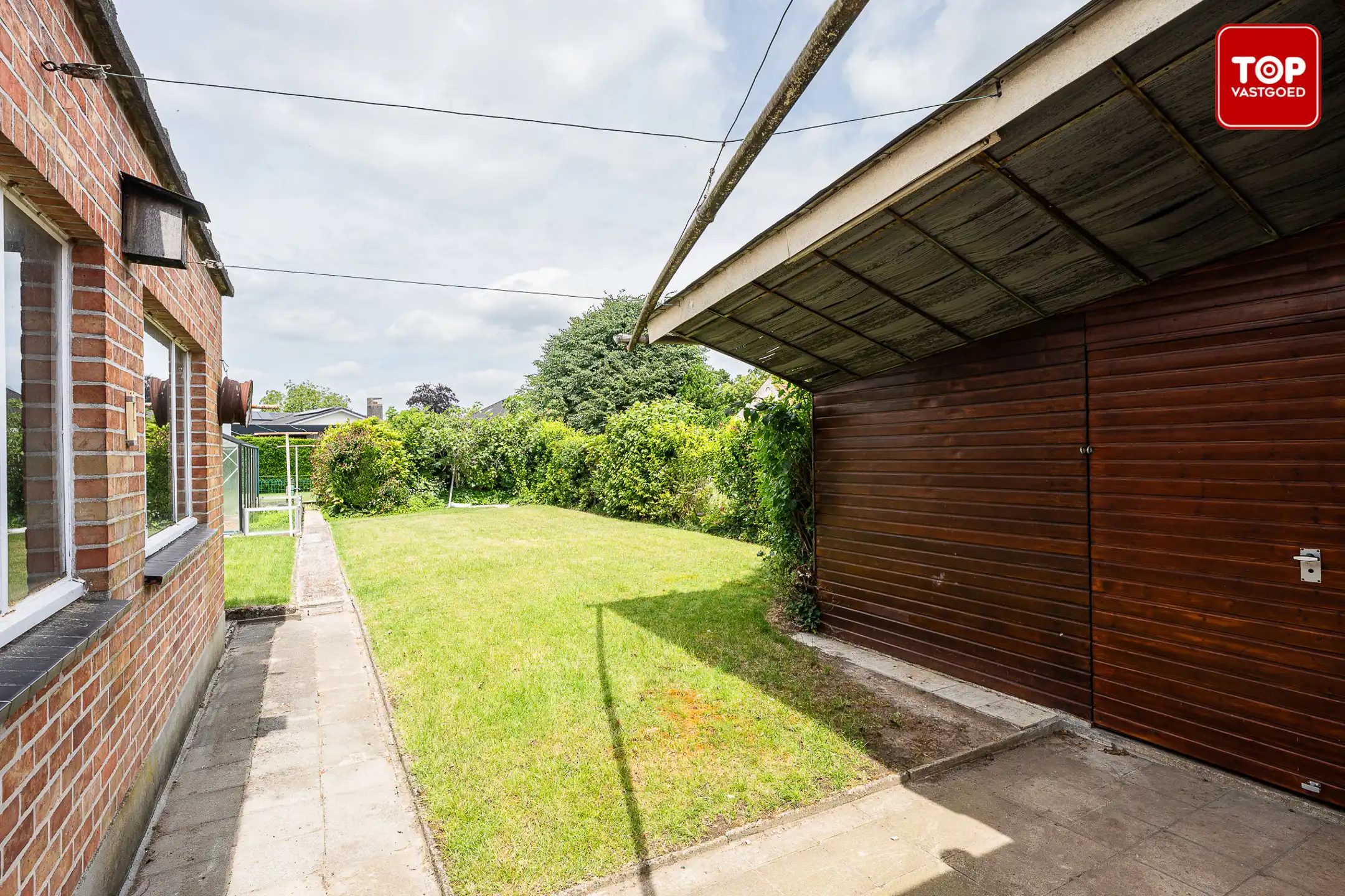 Halfopen bebouwing met 3 slaapkamers, zonnige tuin en garage  foto 24