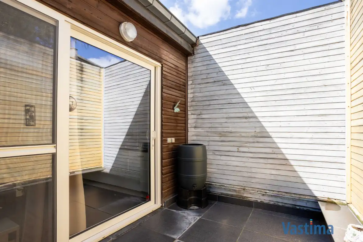 Energiezuinige en instapklare starterswoning met 2 slaapkamers in hartje Erembodegem foto 17