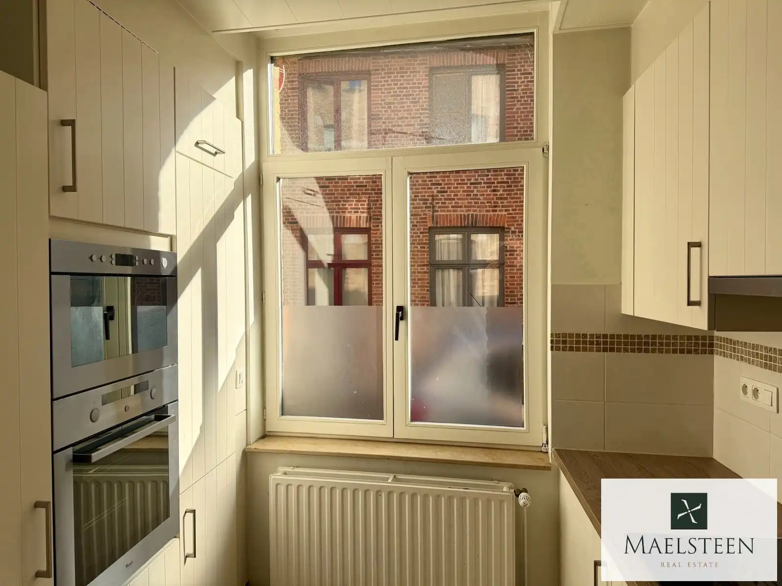 Instapklare trapgevelwoning, gelegen in Brugge centrum foto 3