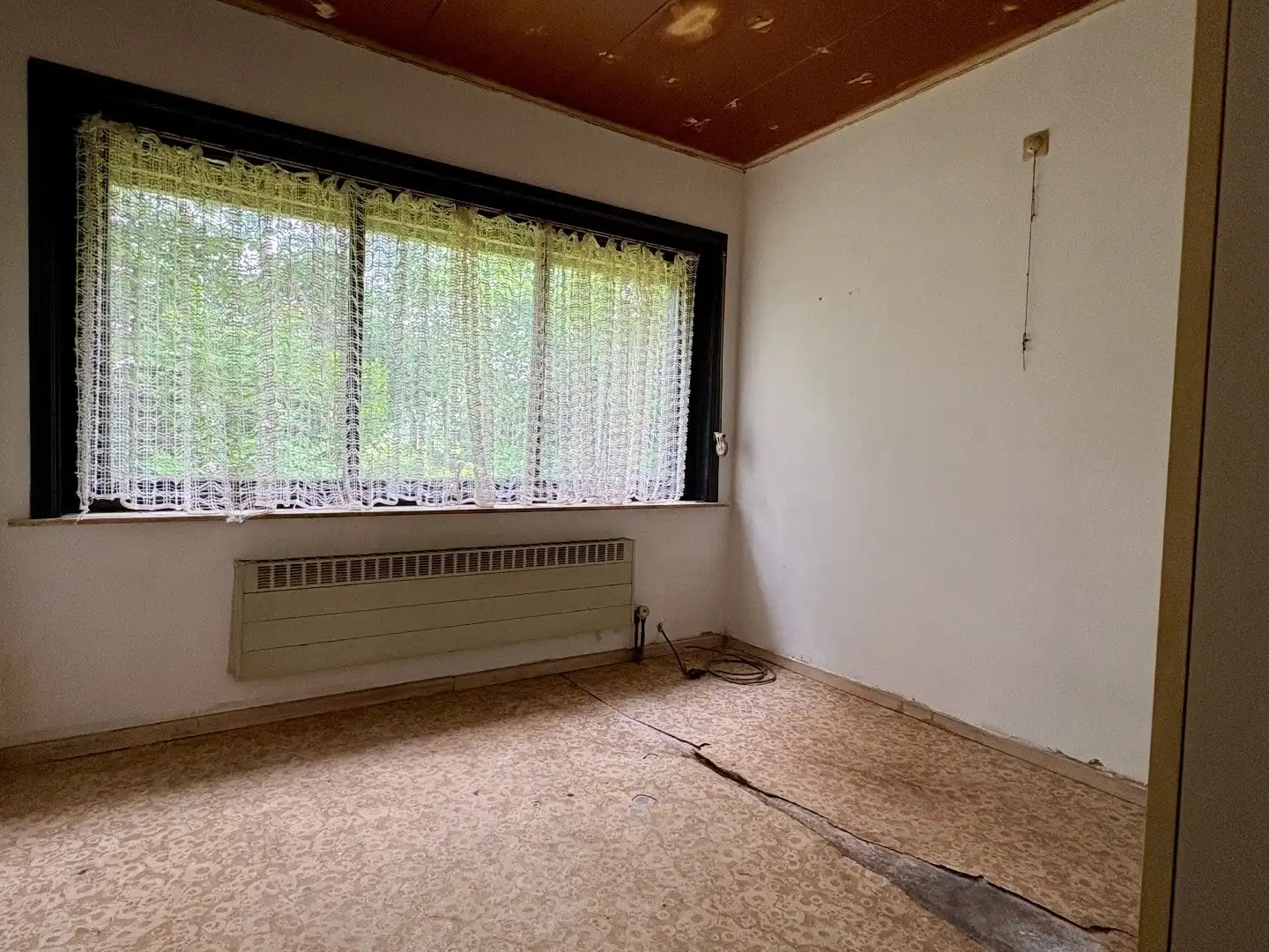 Te renoveren gelijkvloerse villa op 954 m² met landelijke verzichten te Bavikhove. foto 11