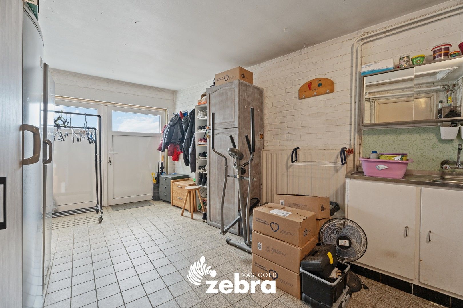 Ruime licht op te frissen woning met drie slaapkamers te Tielt! foto 13