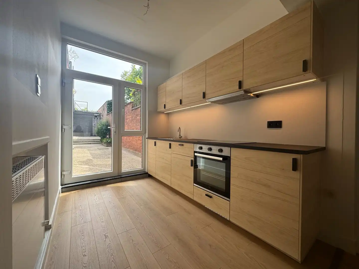 Ruim gerenoveerd gelijkvloers appartement met dubbele garage in het centrum van Diepenbeek foto 6