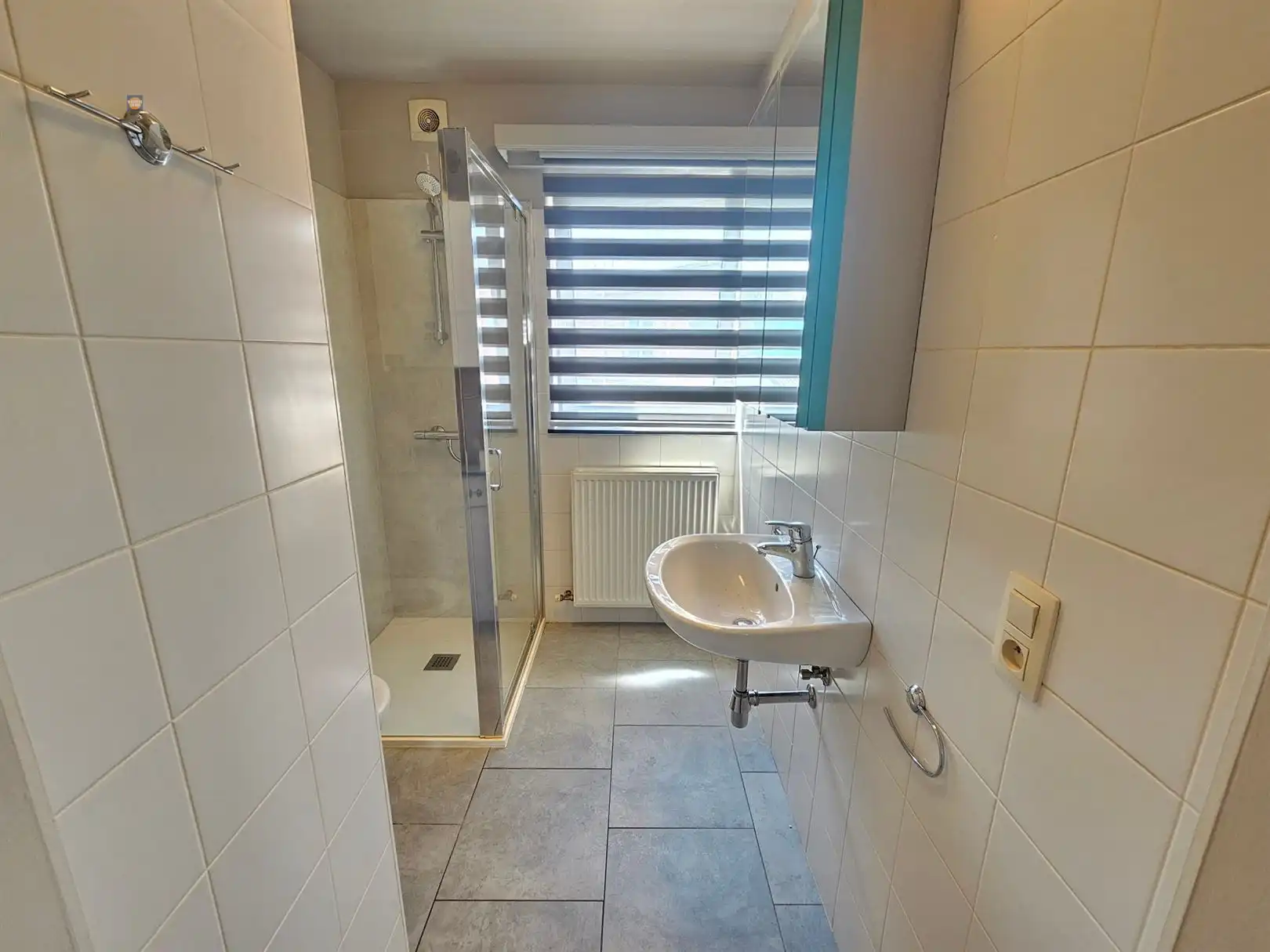 Instapklaar 1-slaapkamerappartement met kelderberging in centrum Willebroek foto 8