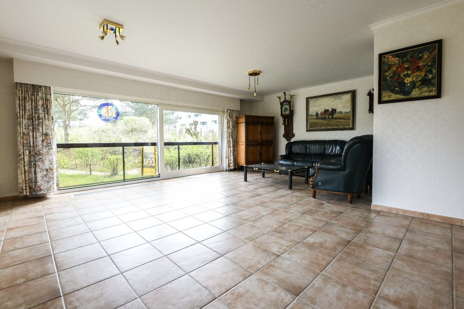 Prachtig gelegen appartement met zuidelijke oriëntatie, te midden van een groene omgeving, grenzend aan het Yzerpark, nabij de Dumortierlaan en het strand. Inpa foto 6