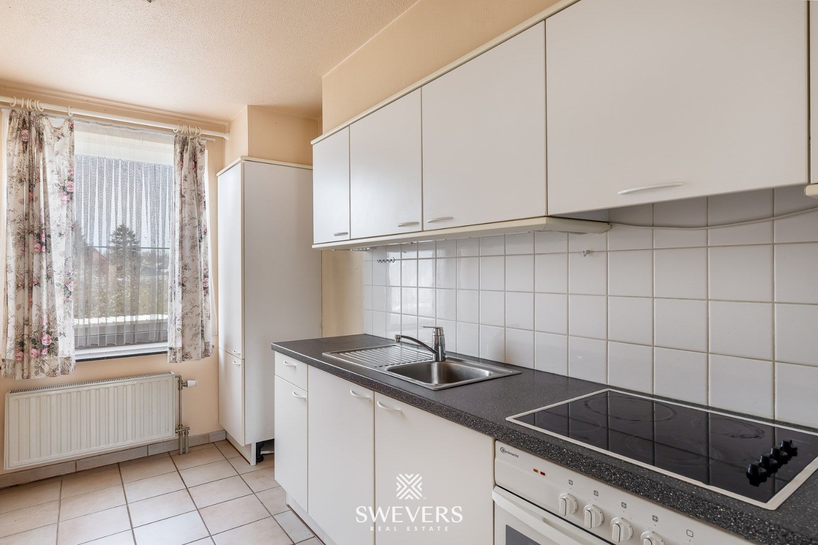 Rustig gelegen 2 slaapkamer appartement in Beringen-centrum met autostaanplaats foto 11