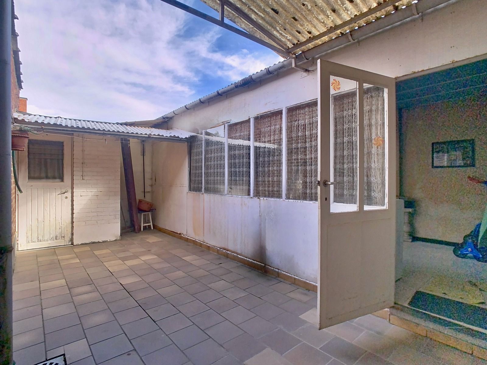 Zéér Ruime Woning met voormalig Handelspand én Tuin! foto 18
