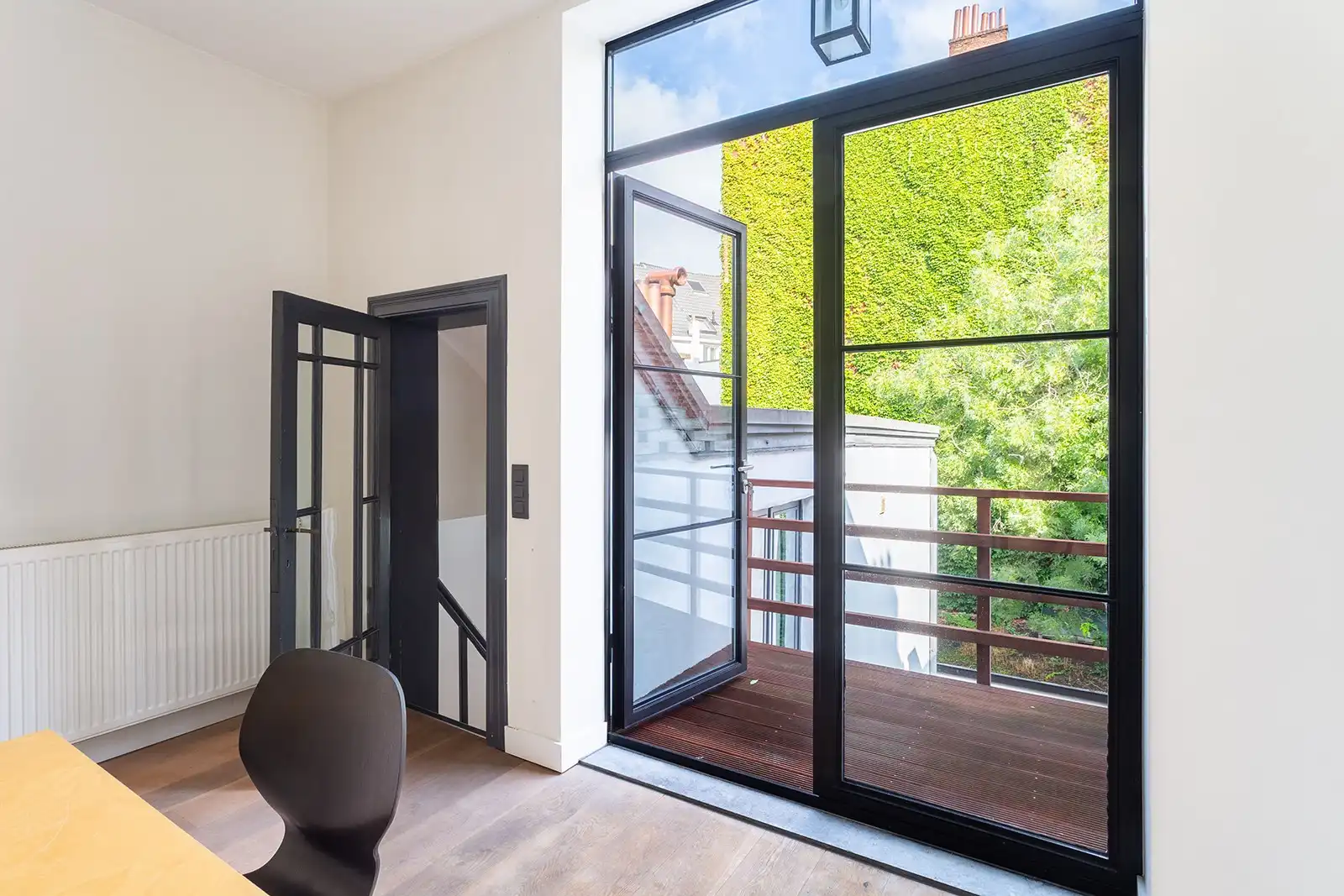 Duplex met terras in bruisende buurt foto 9
