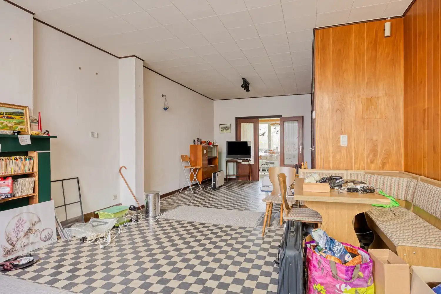 Te renoveren woning met veel potentieel gelegen in het centrum van Sint-Pieters-Leeuw foto 3