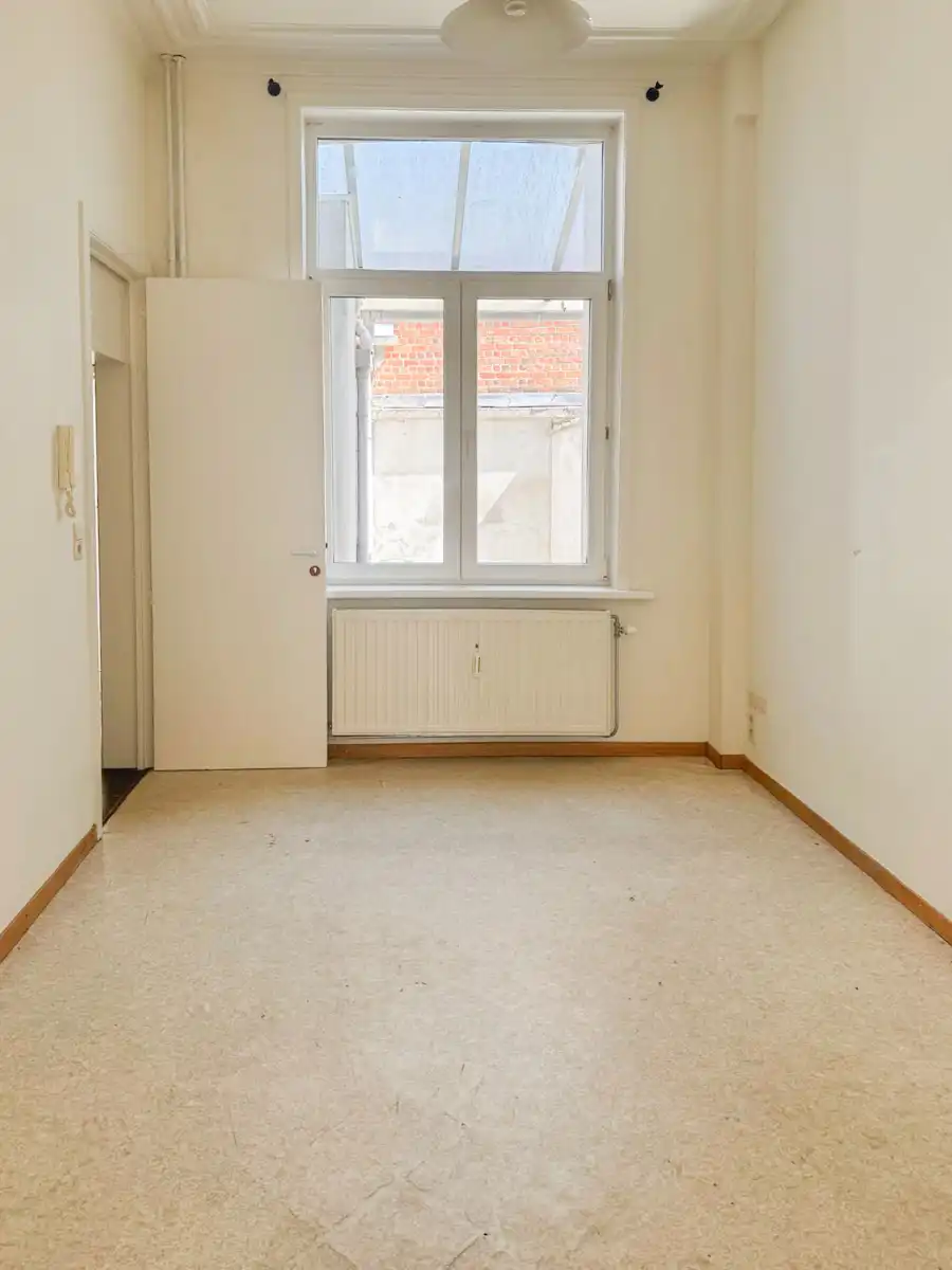 Praktische rijwoning met 3 ruime slaapkamers op zeer gunstige ligging! foto 4