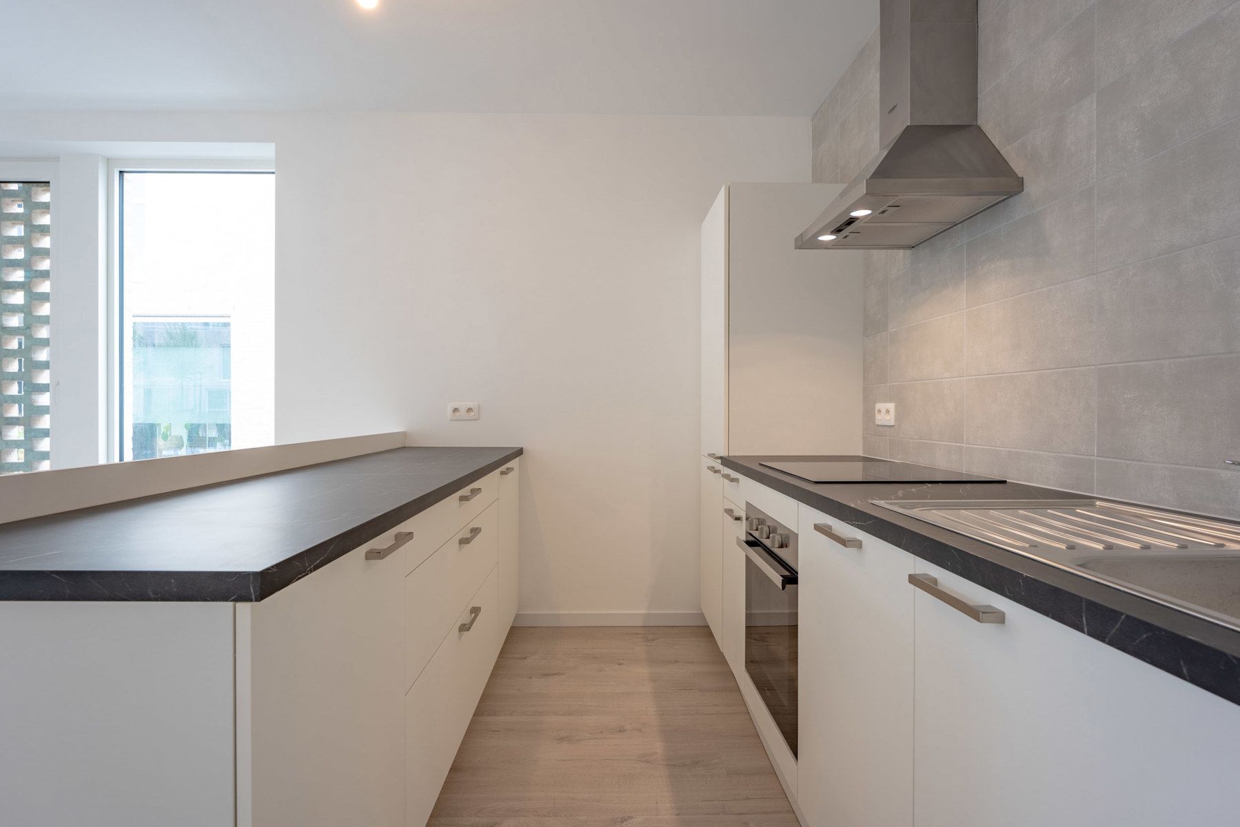 Zéér verzorgd nieuwbouwappartement met autostaanplaats en terras! foto 7