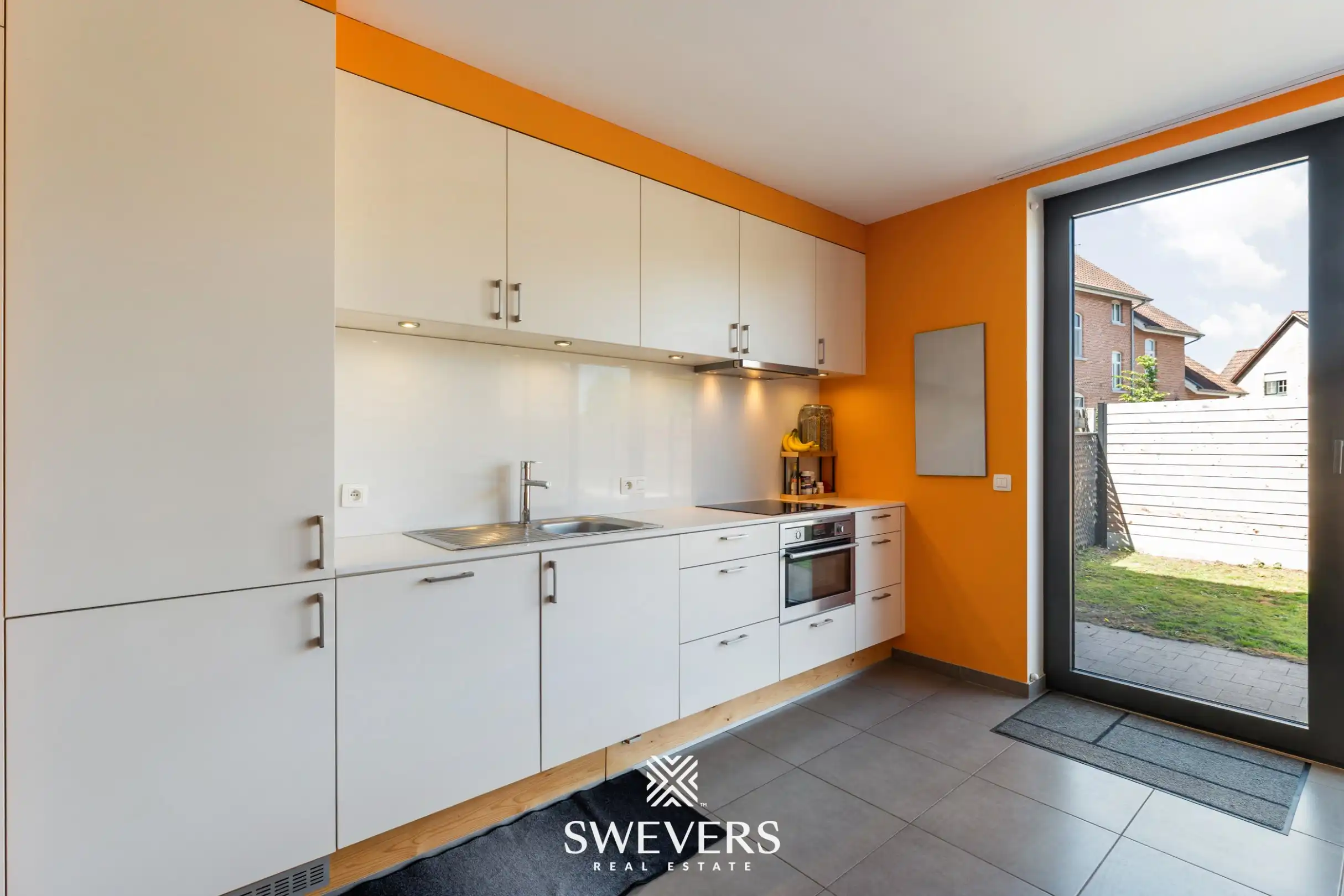 Instapklare halfopen woning met 3 slaapkamers in rustige straat te Beverlo foto 12