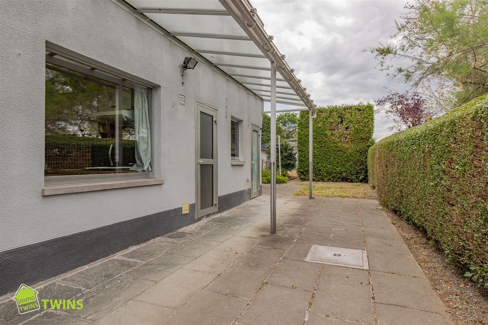 Halfopen bebouwing met 3 slaapkamers en tuin te Grembergen foto 3