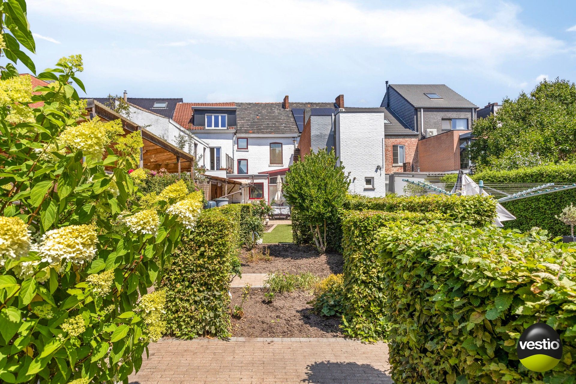 Schitterend gelegen stadswoning met grote tuin en mogelijkheid tot aankoop garagebox! foto 24