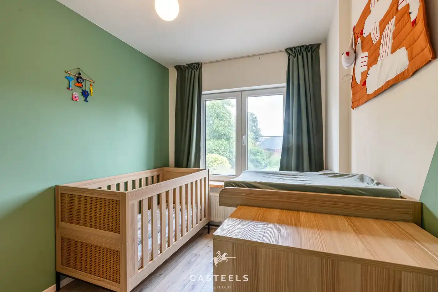 Karaktervolle starterswoning met tuin in Gentbrugge foto 16