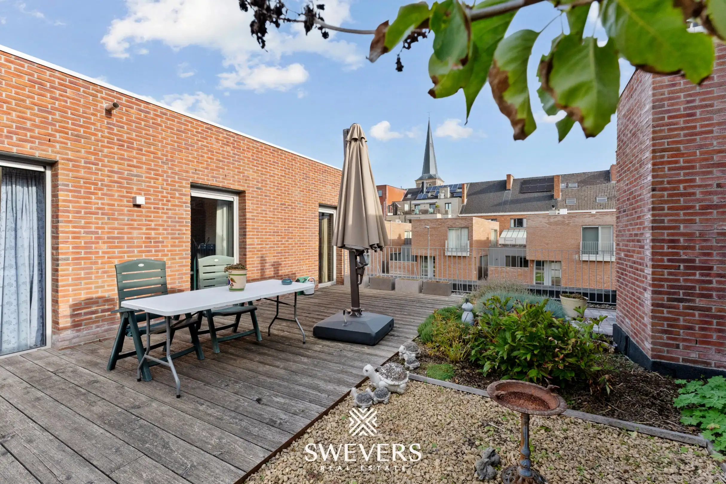 Recent en ruim duplex appartement (140m²) met 2 grote terrassen in centrum Diepenbeek foto 15