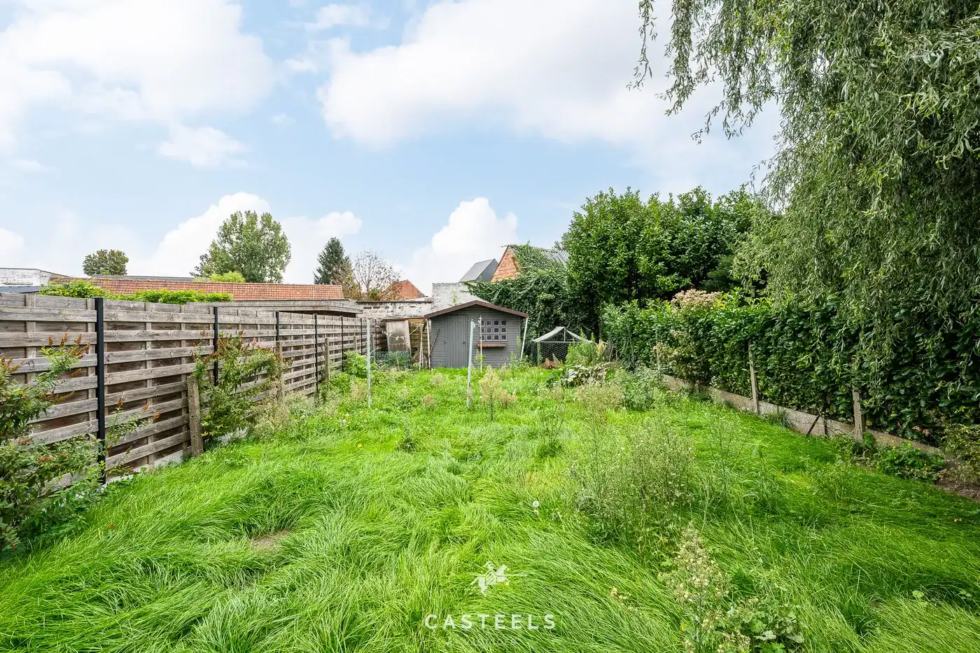 Te renoveren woning met ruime tuin in Merelbeke Flora foto 2