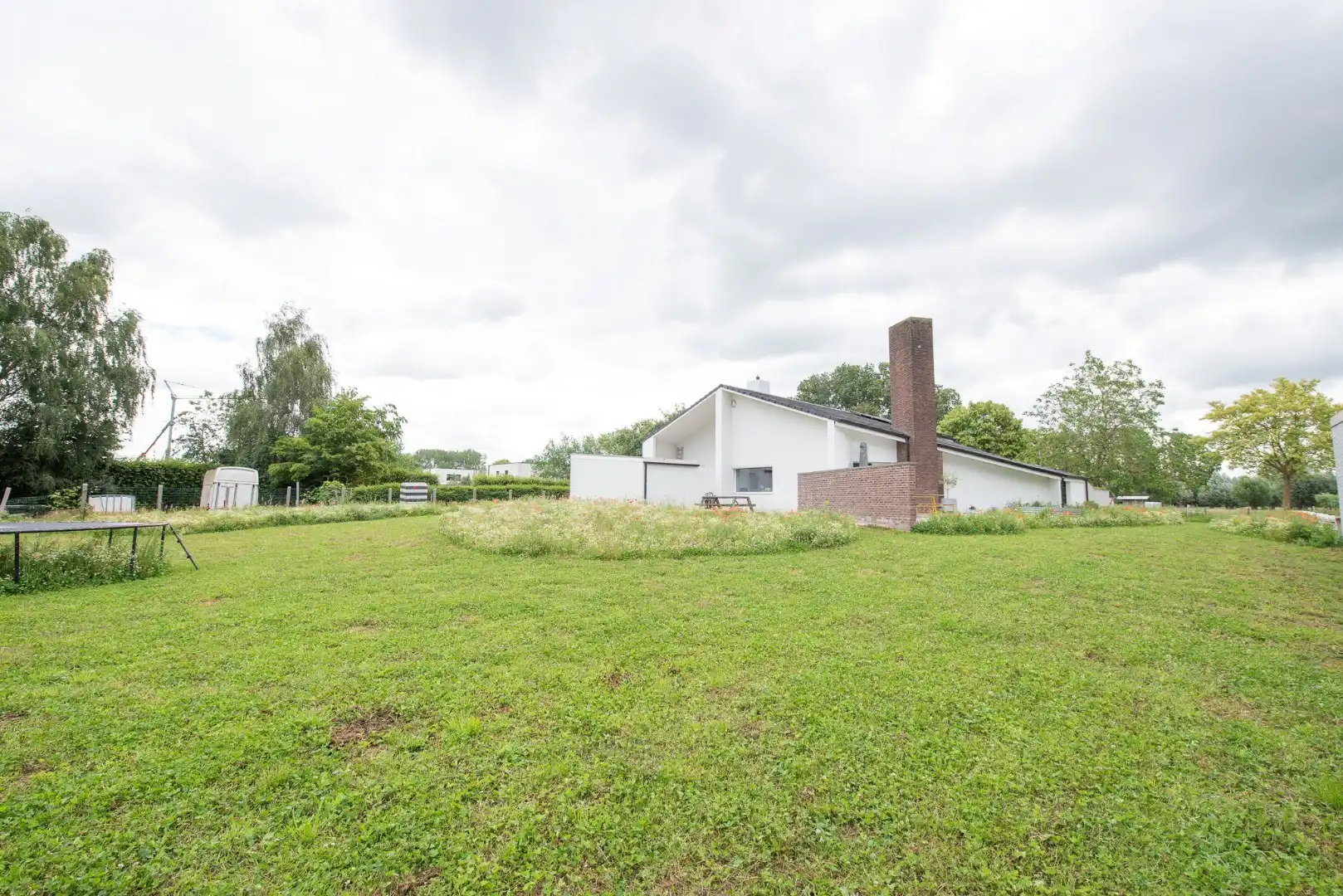 TE KOOP: Ruime architectenwoning in residentiële wijk 'De Piste'. Rustig, groen en zeer bereikbaar perceel van 1800m²! foto 25