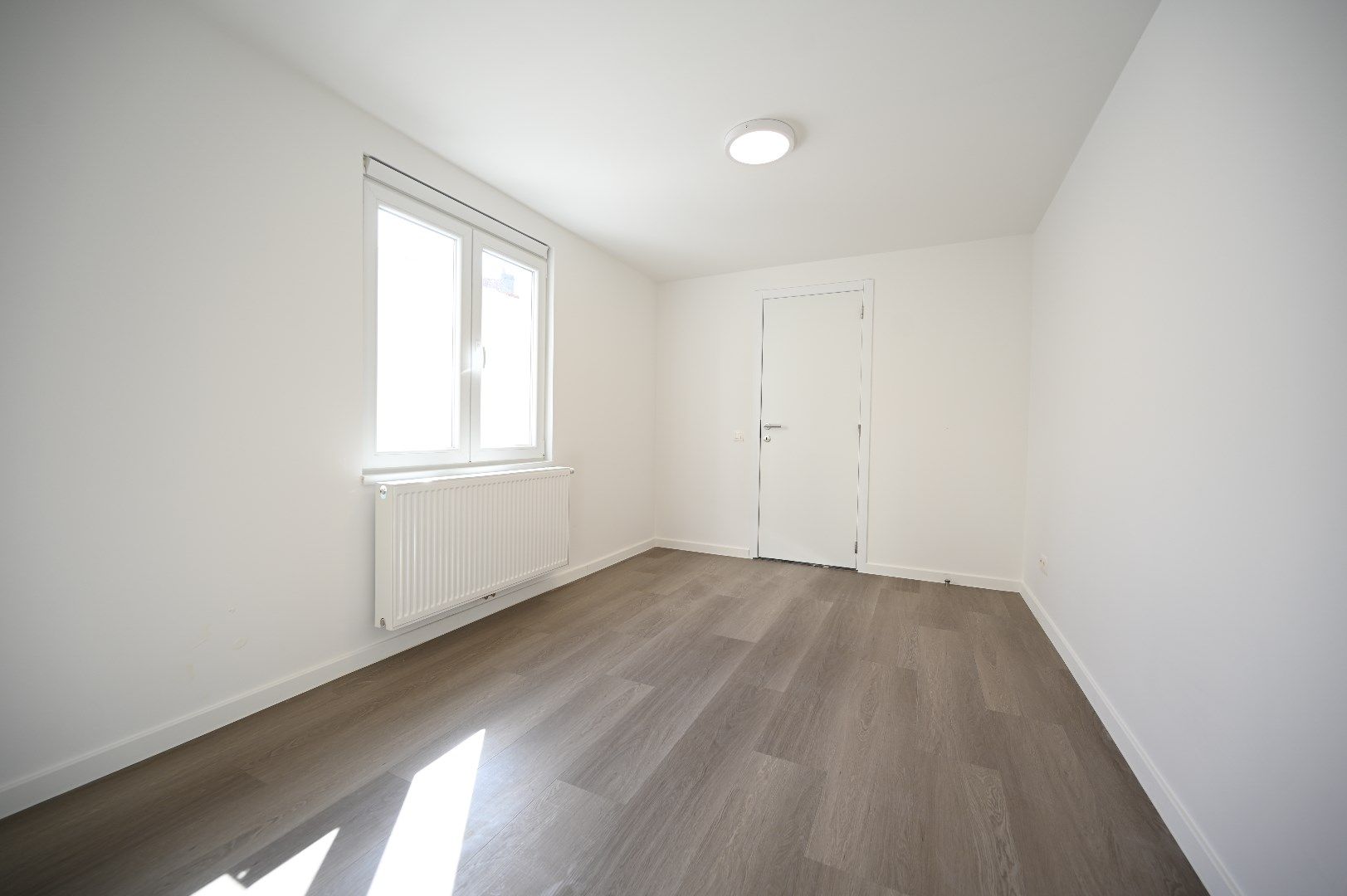 VOLLEDIG GERENOVEERD 1-SLAAPKAMER APPARTEMENT MET TERRAS foto 7