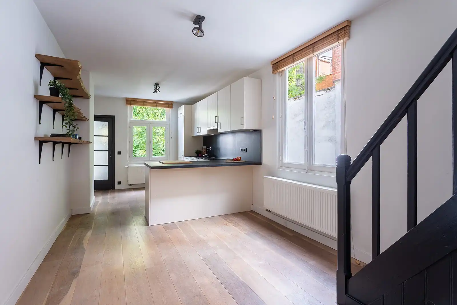 Duplex met terras in bruisende buurt foto 14