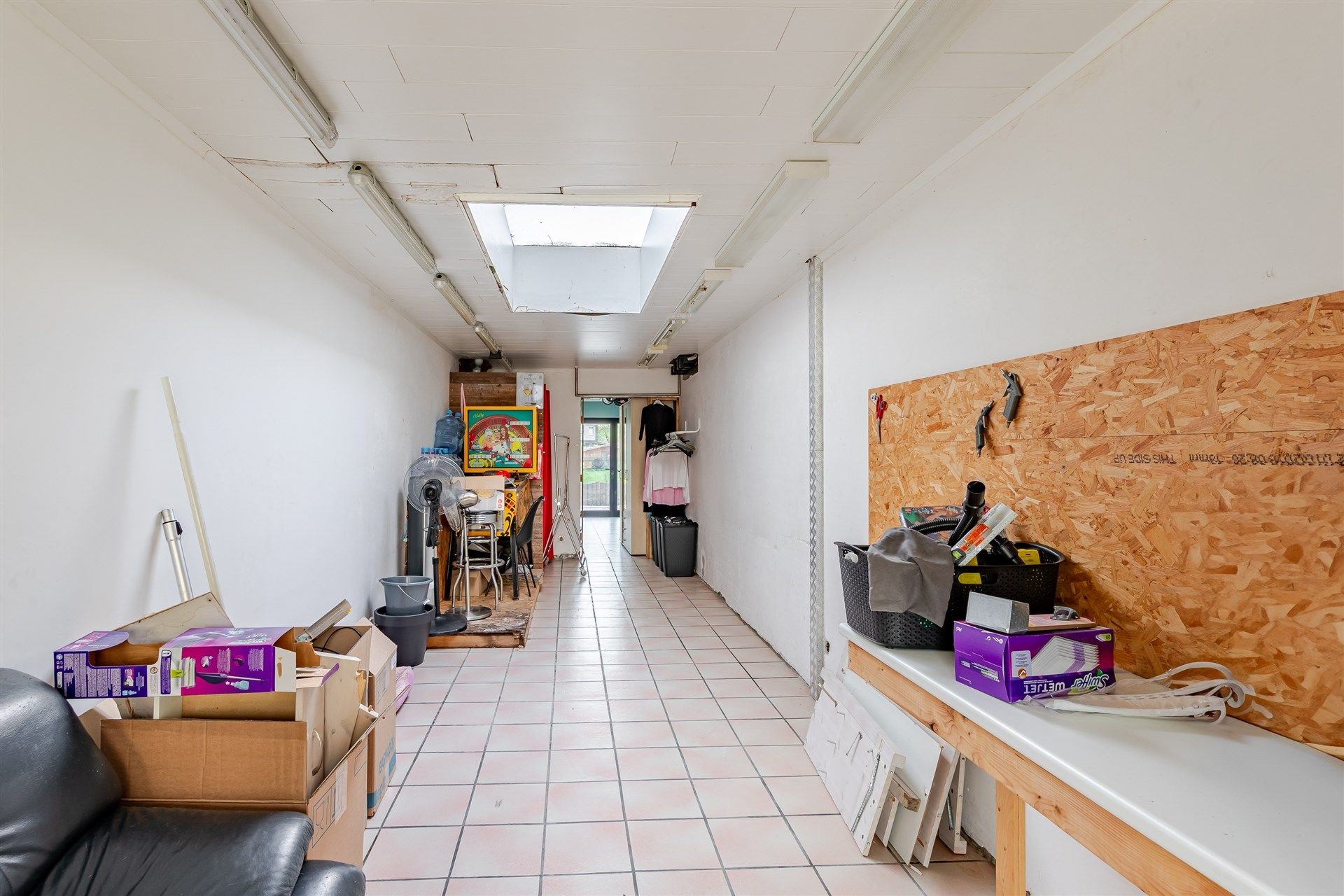 Bijzonder ruime woning met diepe tuin in Wetteren centrum foto 9