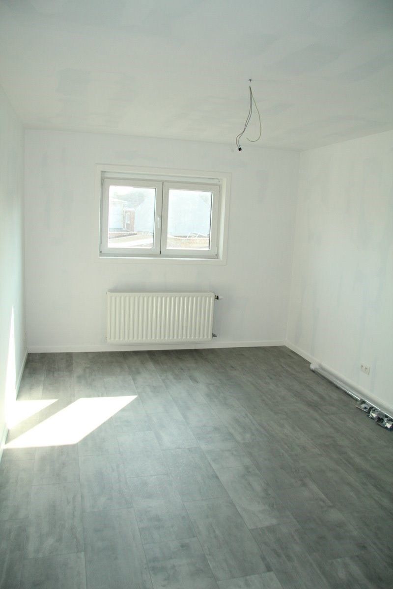 Uiterst ruime, recente woning met 3 slk, garage en tuin in centrum Berlare foto 14