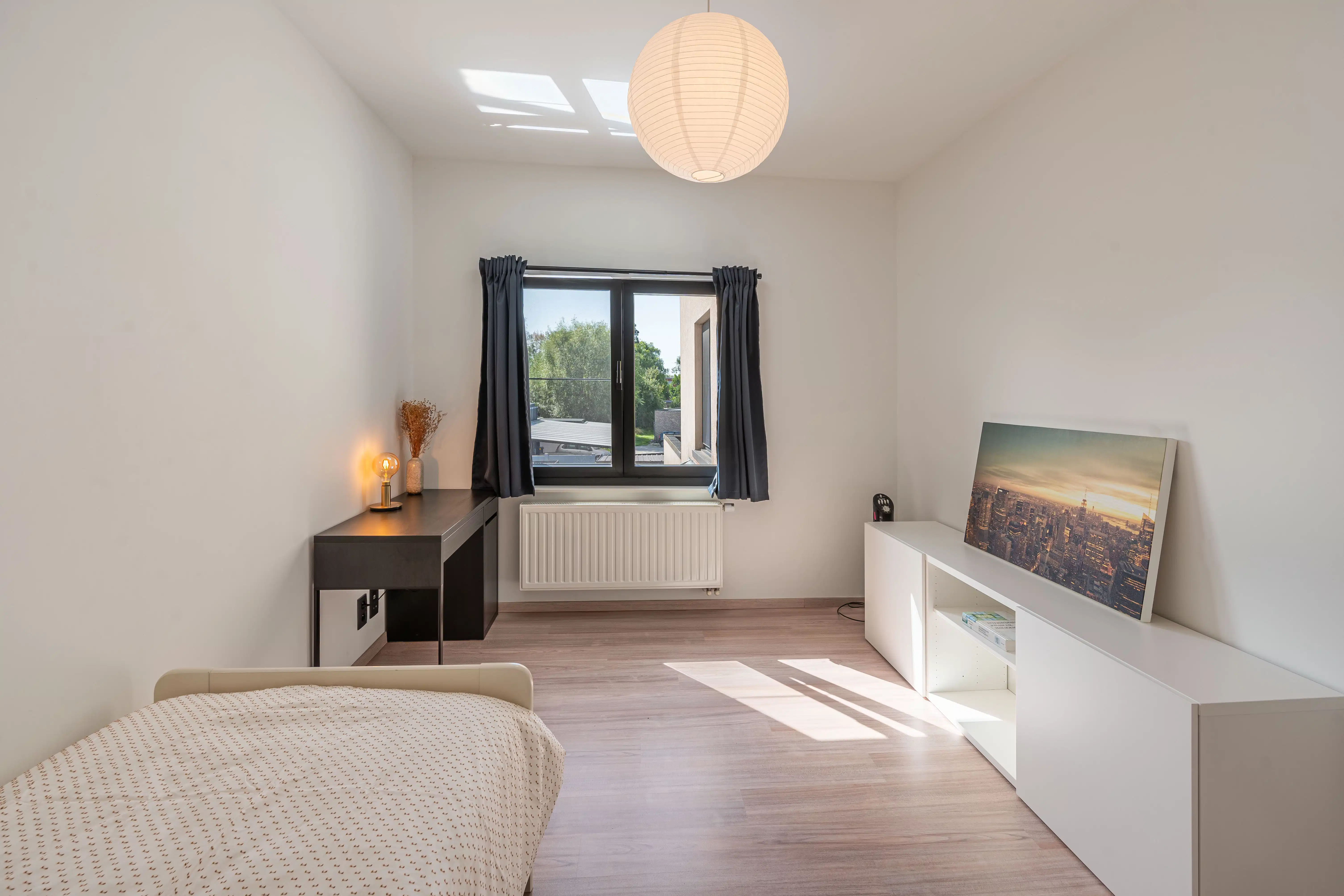 Instapklare en verrassend ruime woning in hartje Willebroek foto 11