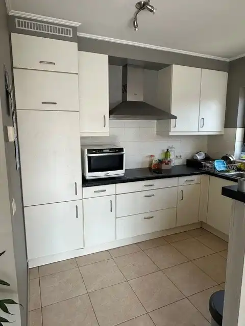 Lichtrijk duplex appartement met 2 slaapkamers en garage foto 6